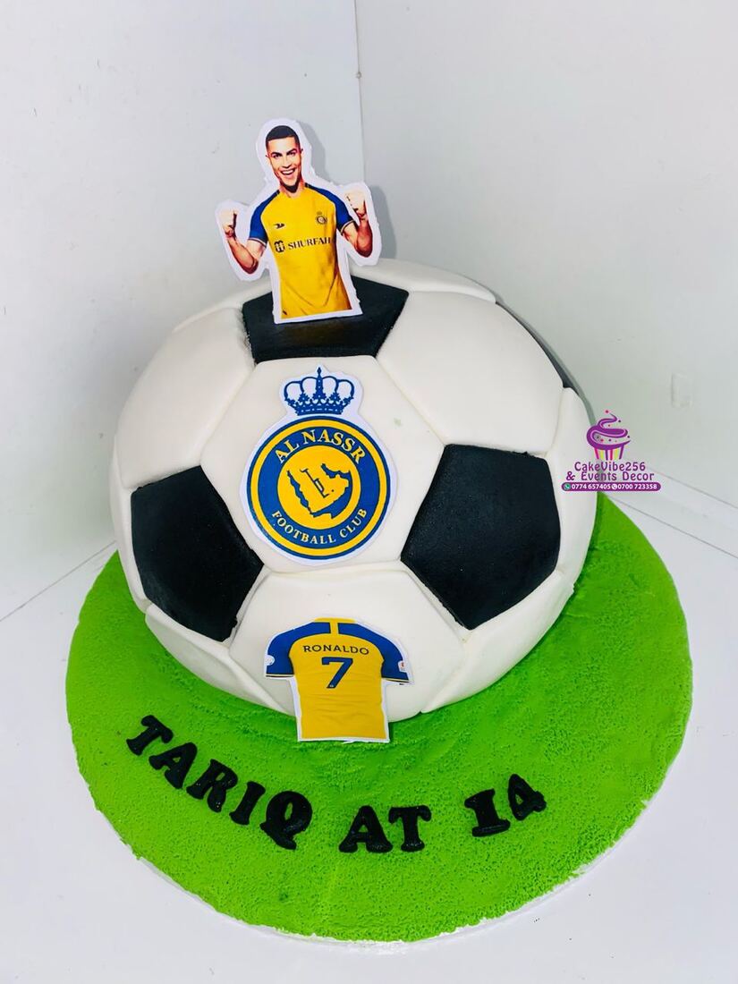 Football-shaped birthday cake with player graphic, Kampala
