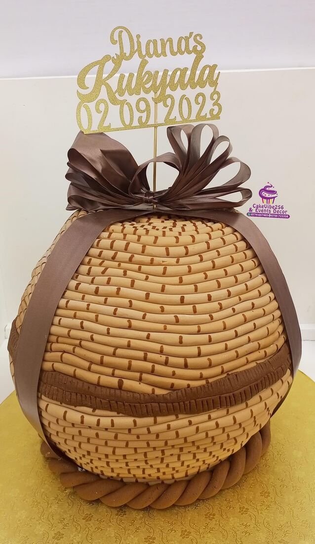 Woven basket kwanjula introduction ceremony cake with bow